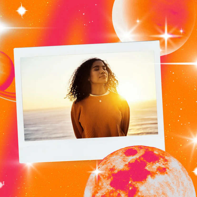 Young woman taking in the sunset after reading her October 2026 horoscope.