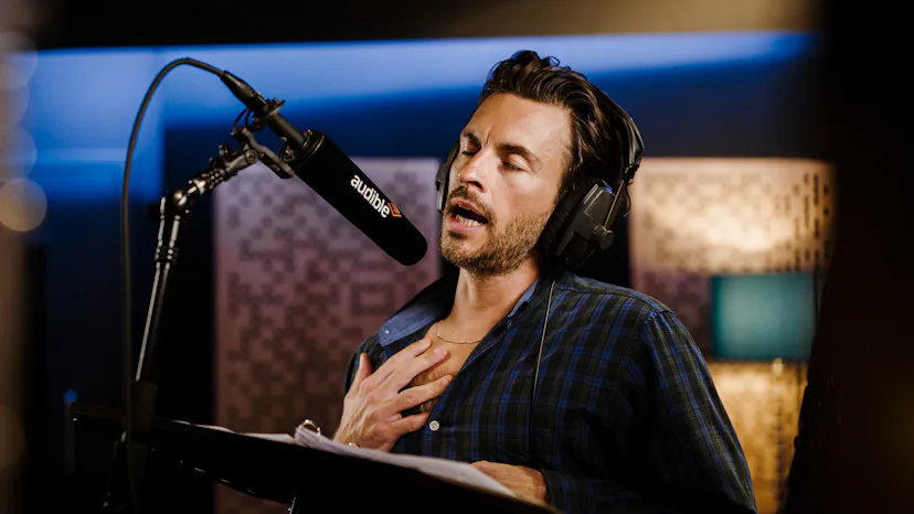 Jonathan Bailey recording as Dracula. Photo via Audible