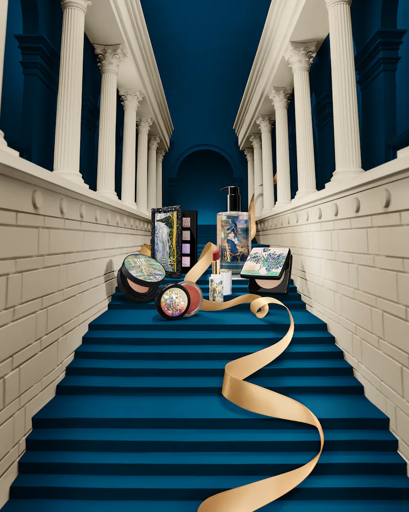A selection of products from the bobbi brown x met collection, situated on the met stairs