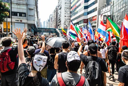 Two protesters with Guy Fawkes masks during the demonstration