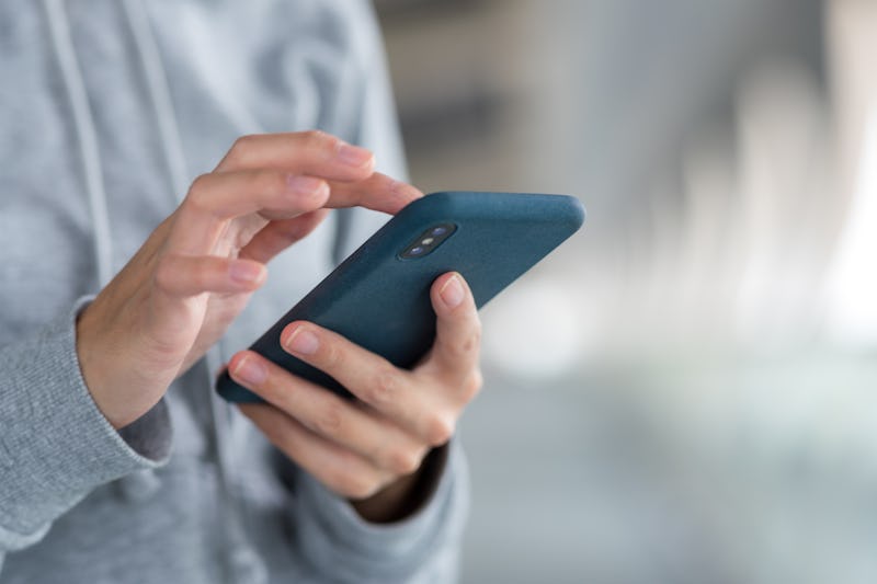 Woman use of cellphone at outdoor