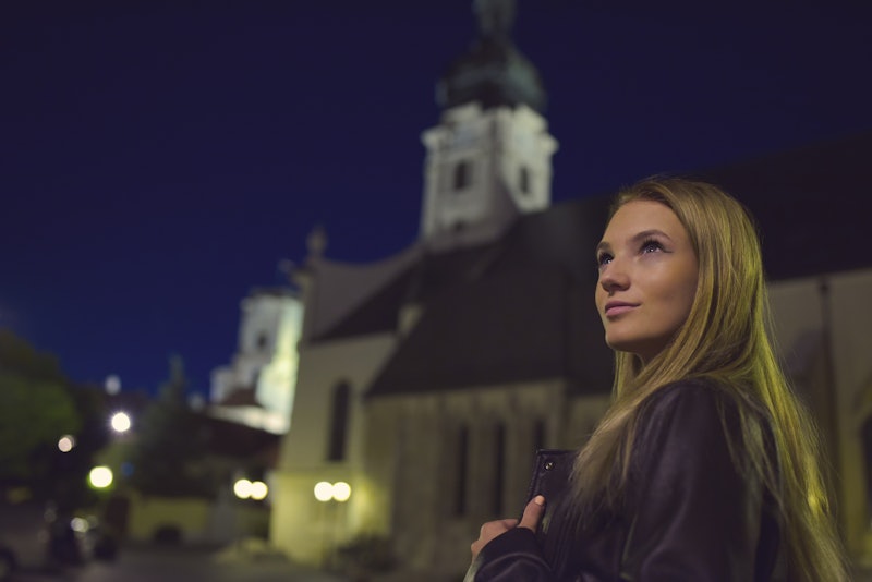 Teen Girl Night Portrait with Church Tower