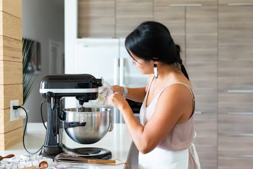 Woman Baking in the Kitchen Using KitchenAid mixer