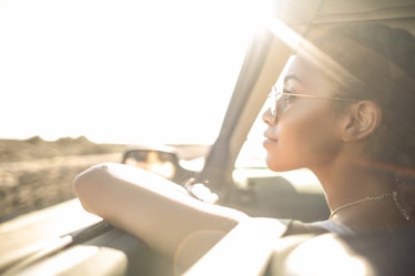 Girl traveling by car