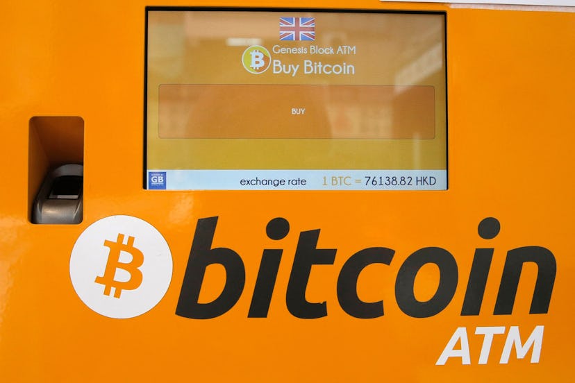 A Bitcoin ATM is seen in Hong Kong, . Bitcoin is the world's most popular virtual currency. Such cur...