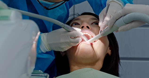 Woman have dental check up in the clinic