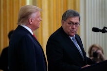 Attorney General William Barr speaks as President Donald Trump listens, during a Medal of Valor and ...