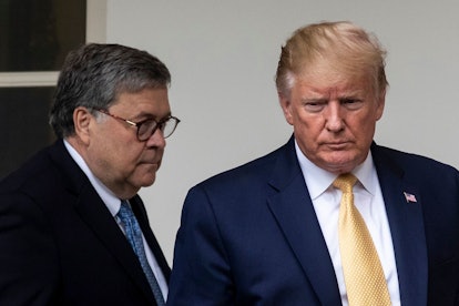 US President Donald J. Trump (R) and US Attorney General William Barr (L) walk down the Colonnade fo...