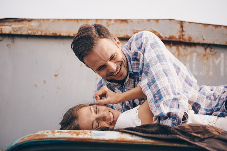 Car couple. Sexy couple. Couple in love.