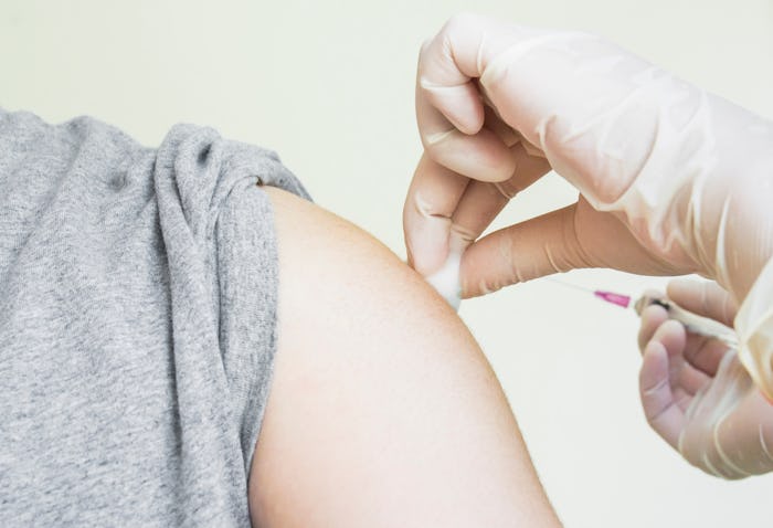 Doctor preparing a patient injection