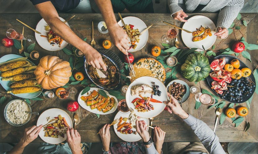 a Friendsgiving event potluck style with various meals on the table