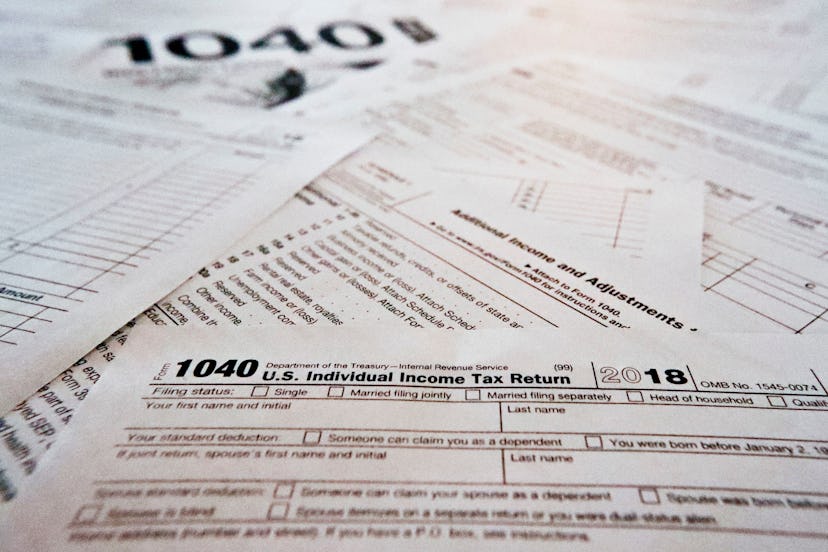 PHOTOS**This photo made, in Zelienople, Pa., shows mulitiple forms printed from the Internal Revenue...