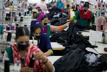 Bangladeshis work at Snowtex garment factory in Dhamrai, near Dhaka, Bangladesh. A new survey says t...