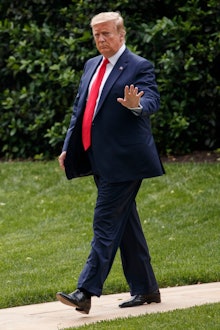 US President Donald J. Trump walks to board Marine One on the South Lawn of the White House in Washi...