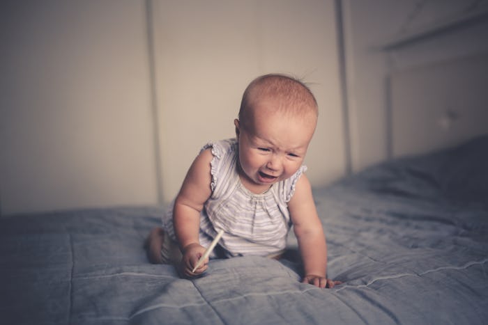 A baby suddenly screaming for no reason is a baby overwhelmed, experts say.