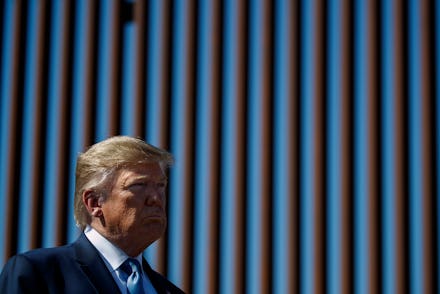 President Donald Trump tours a section of the southern border wall, in Otay Mesa, Calif