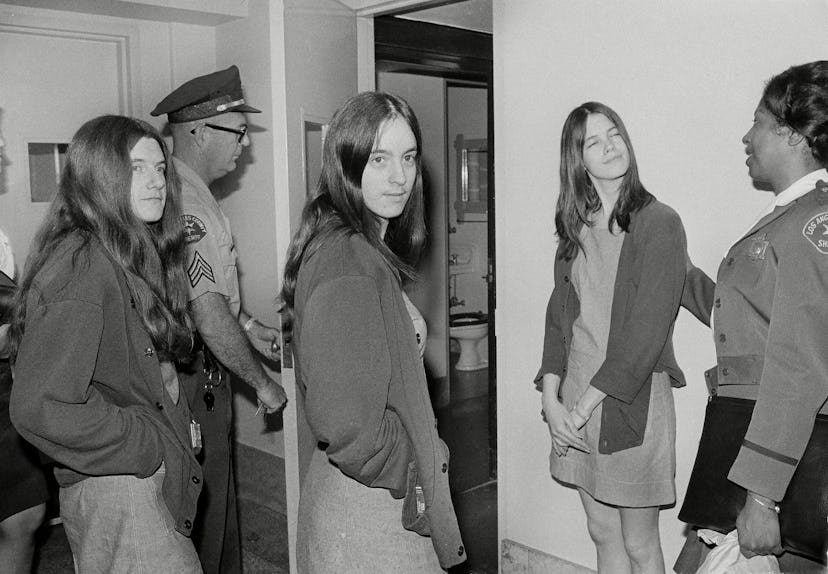 Leslie Van Houten, Susan Atkins, Patricia Krenwinkel Dressed in jail denims, three women who are co-...