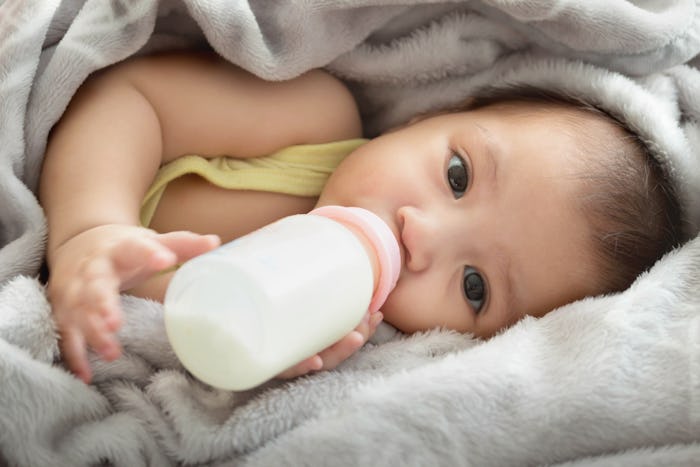 Close up of  feeding  baby