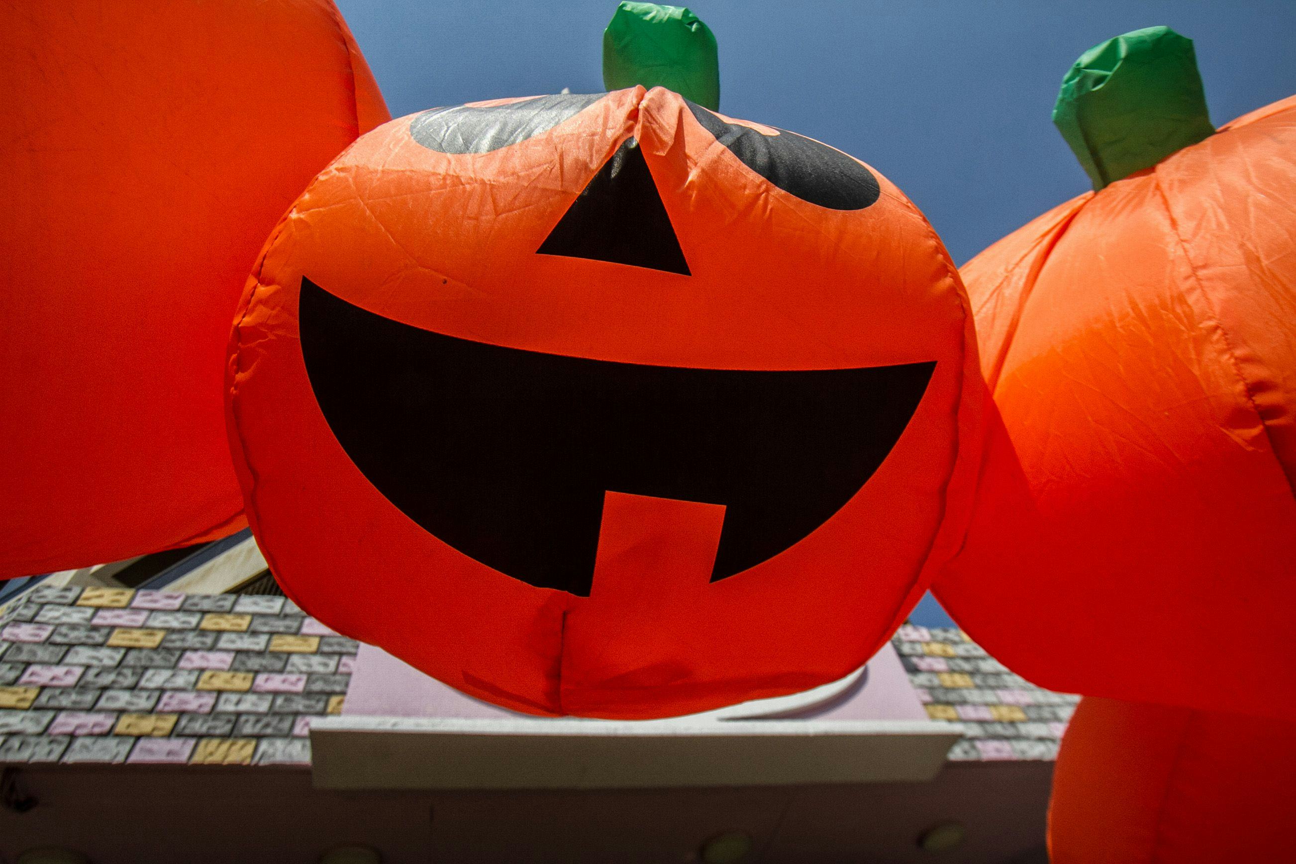 A shop selling Halloween decorations including witches masks and pirates  and pumpkins in Beirut