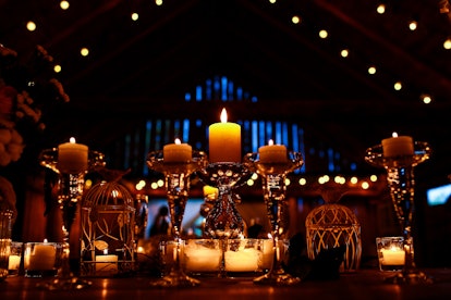 Festive served dinner table stands in the storage