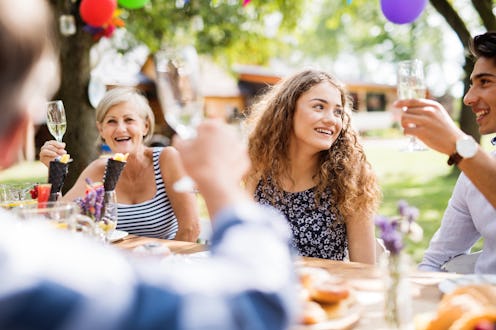 Family celebration or a garden party outside in the backyard.