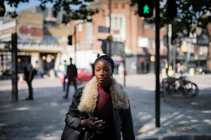Getting up and walking is a good tactic for how to stay awake at work.