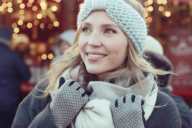 There are many ways to pack light for a winter trip, and bringing a few different hats can help switch up your look.