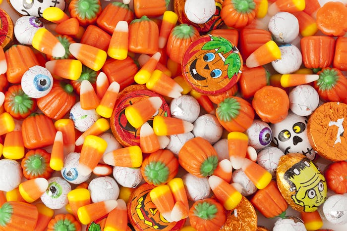 Spooky Orange Halloween Candy against a background