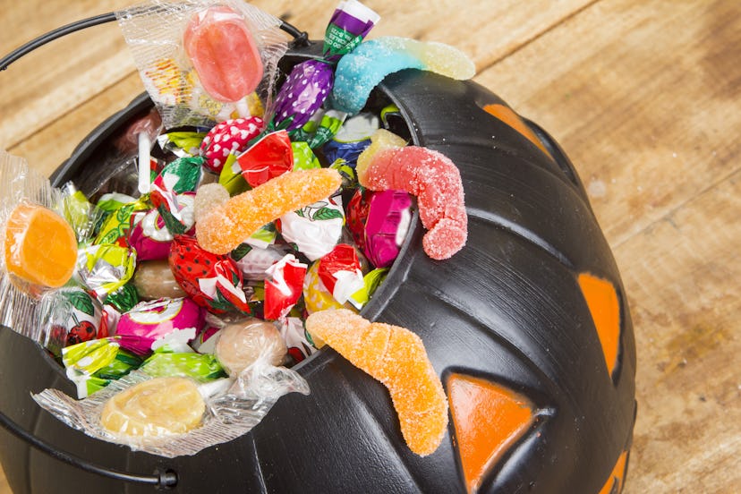 Experts say avoiding Halloween candy completely can cause your children to want it more — moderation...