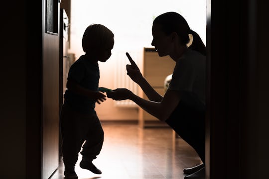 Mom disciplining her child. Teaching-parenting your kid concept. 