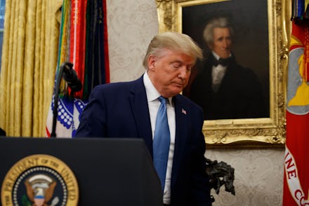 President Donald Trump departs after a ceremony to present the Presidential Medal of Freedom to form...