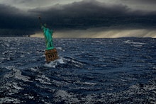 Surreal apocalyptic scene with The Statue of Liberty sinks in the ocean in the sunset under the dram...