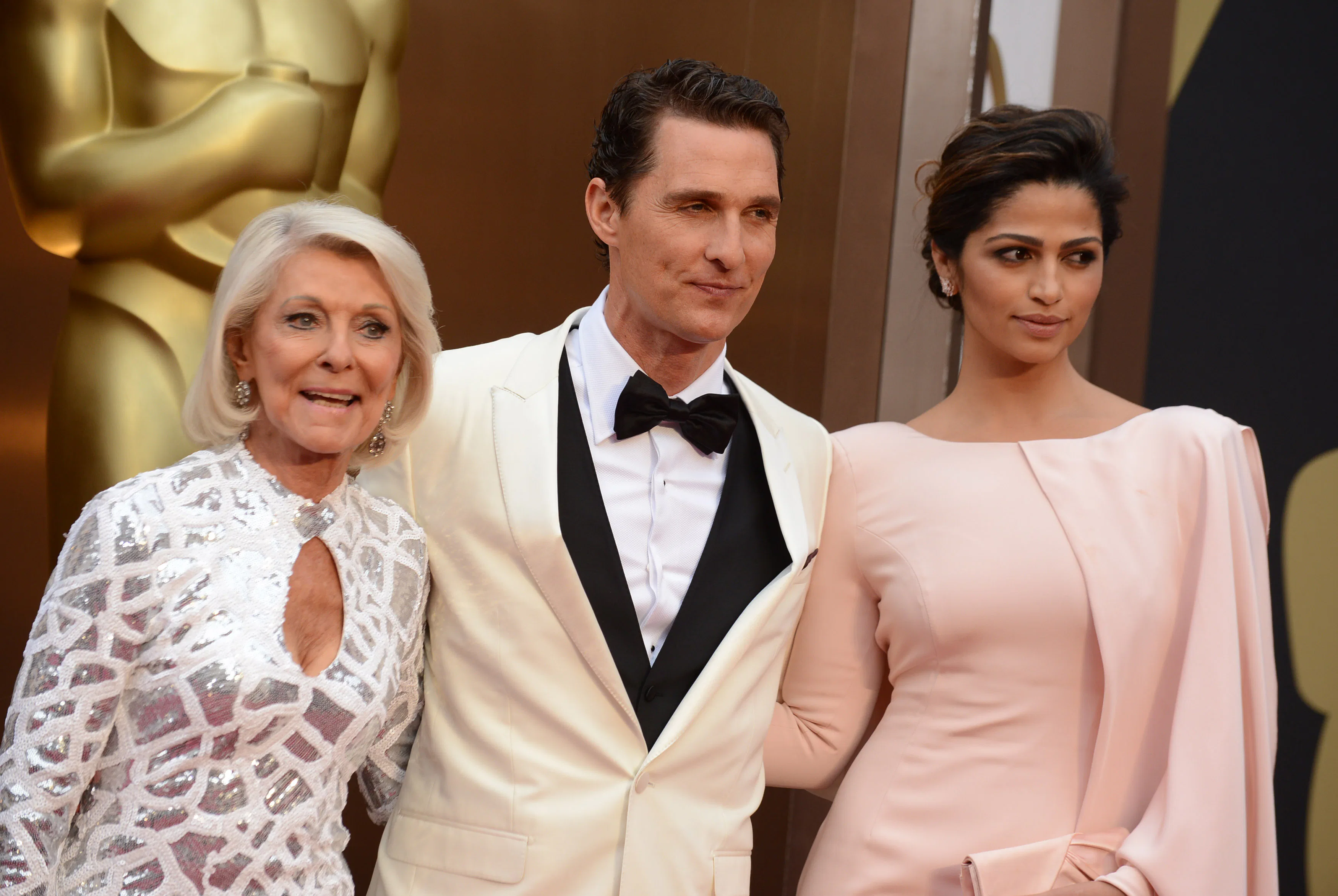 From left, Kay McCabe, Matthew McConaughey and Camila Alves arrive at the Oscars, at the Dolby Theat...