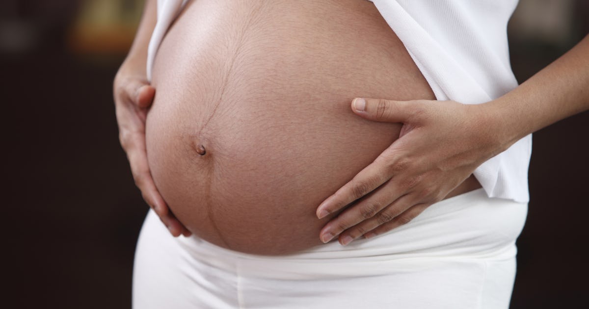 Here's When Your Belly Button Will Pop Out During Pregnancy Here's When Your Belly Button Will Pop Out During Pregnancy