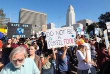 Climate activists participate in a student-led climate change march in Los Angeles on