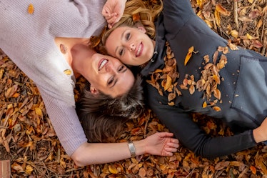 Two gorgeous models enjoying each others company on a fall day