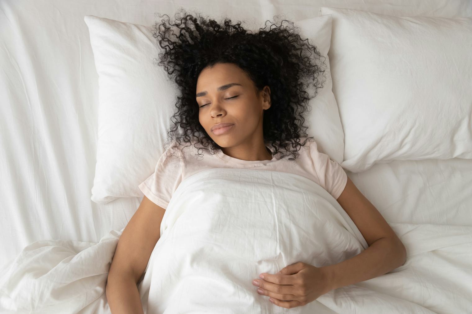 How White Noise Affects Your Sleep, According To Experts