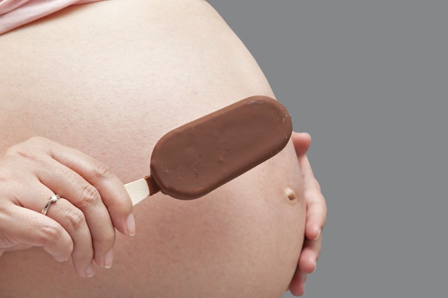 Pregnant women are beautiful, healthy eating ice cream.