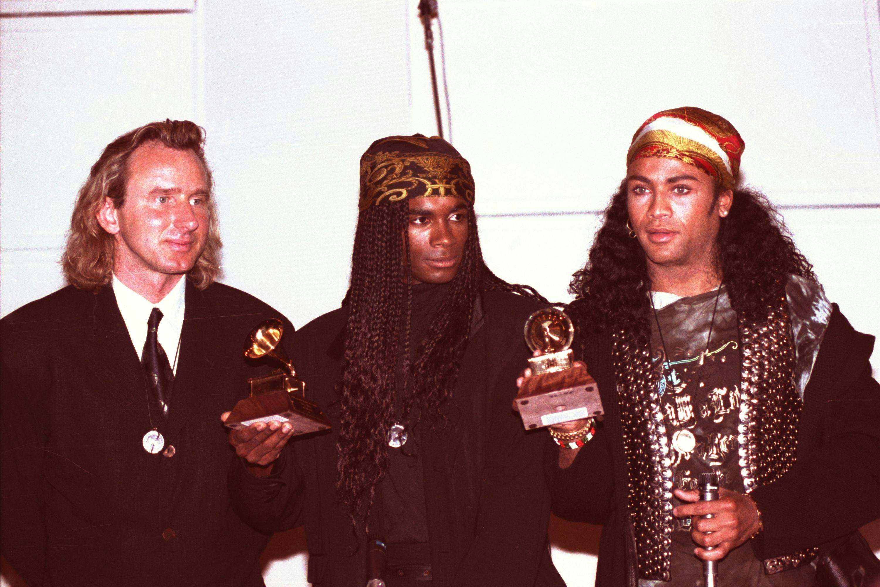 Milli Vanilli Fab Morvan, left, and Rob Pilatus of Milli Vanilli hold up their Grammys for Best New ...