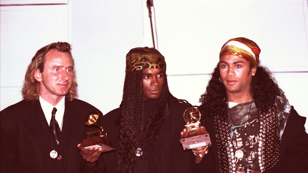 Milli Vanilli Fab Morvan, left, and Rob Pilatus of Milli Vanilli hold up their Grammys for Best New ...