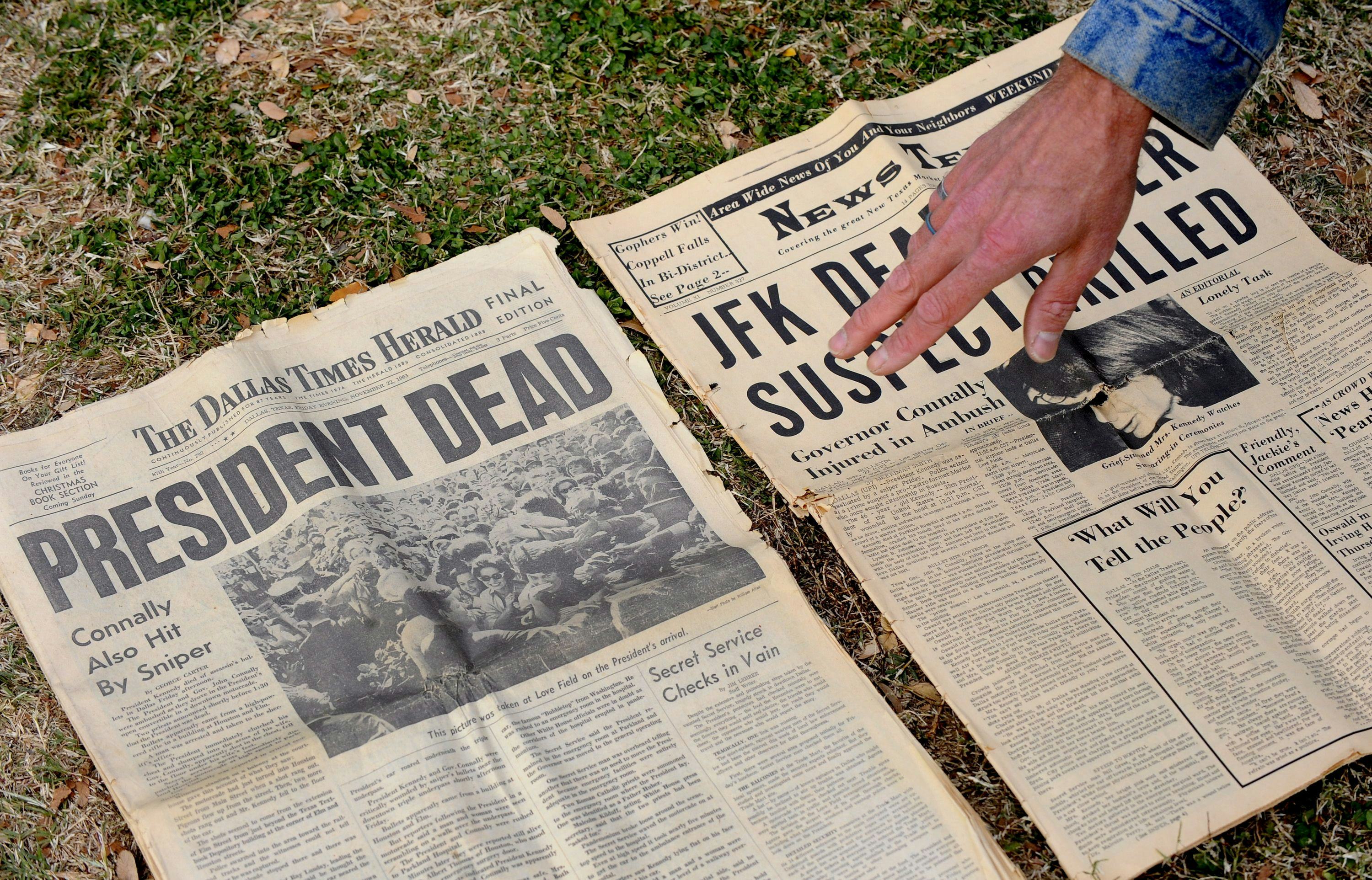 Gary Gossett Shows Two Local Newspapers His Mother Saved From the Day at Dealey Plaza the Site of th...