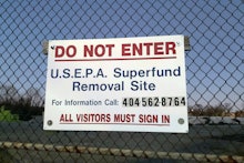 A sign identifies the Superfund removal site on the property of a former high school in Birmingham, ...