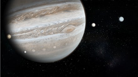 planet Jupiter with 4 of the 69 known moons with the Milky Way galaxy 3d space illustration.