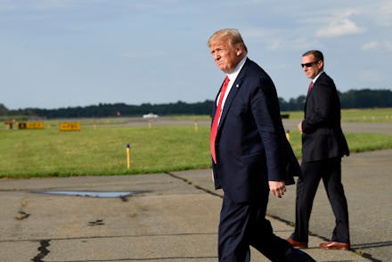 President Donald Trump walks towards Marine One at Morristown Municipal Airport in Morristown, N.J.,...