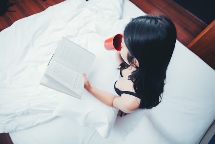 how to get turned on quickly; Woman reading book in bed 