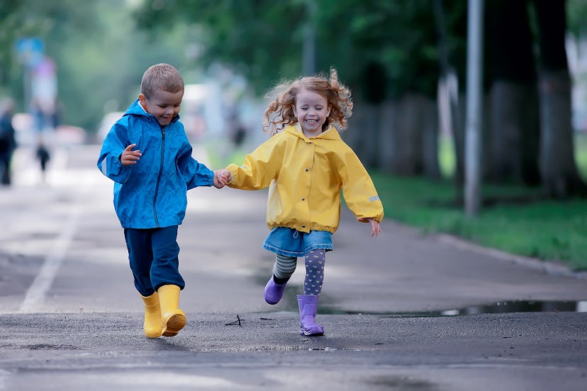 Experts say playing outside really benefits a child's development, even in bad weather.