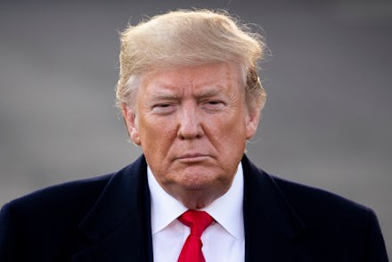 US President Donald J. Trump listens to a question from a member of the news media before departing ...