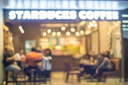 People in Coffee shop blur background with bokeh lights, vintage filter, blurred  of star buck cafet...