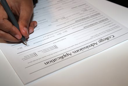 Student submitting her application for college admission.