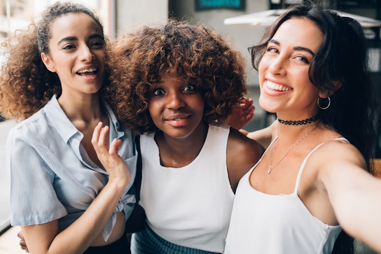Young girls having fun and looking camera – friendship, cheerful, togetherness